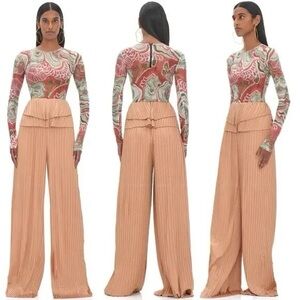 Andrea Iyamah sheer, double layered bodysuit.